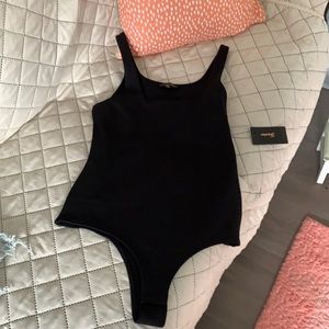 Shinesdar black bodysuit size Medium.